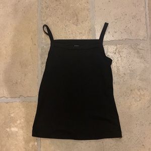 A cute black tank top in the brand piper